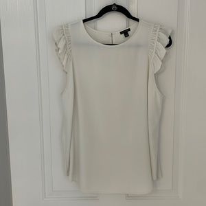 Cream Flutter Sleeve top with Shirtail Hemline